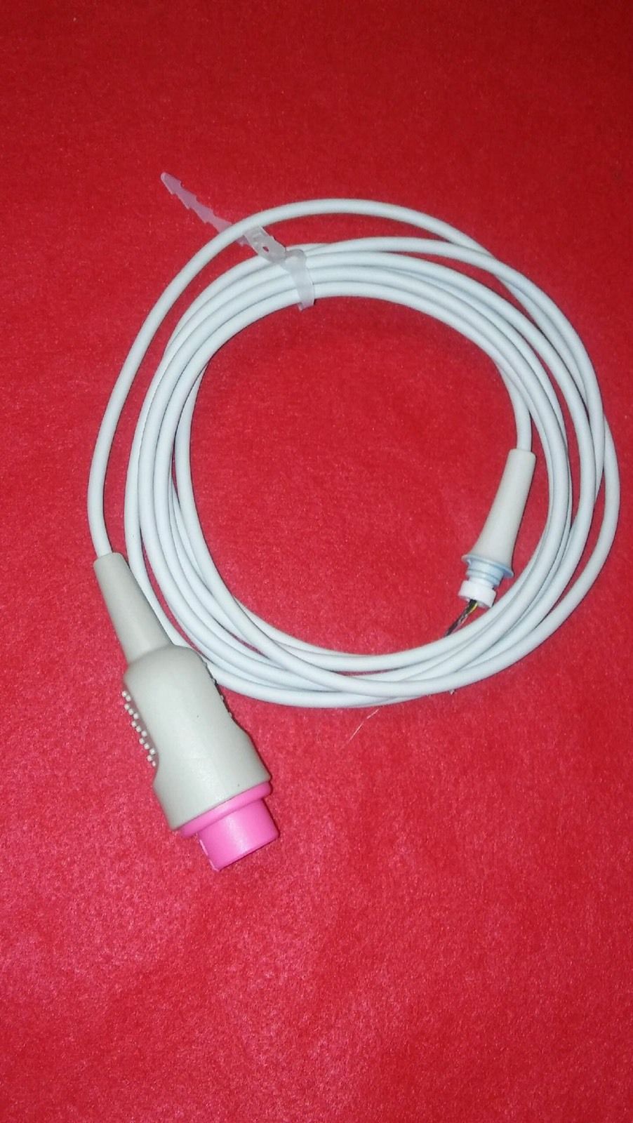 overhead shot of probe wrapped in a circle