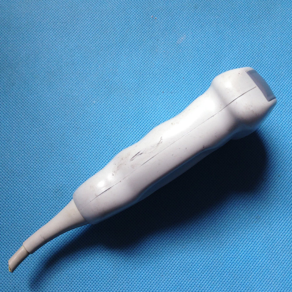a close up of a white probe head profile