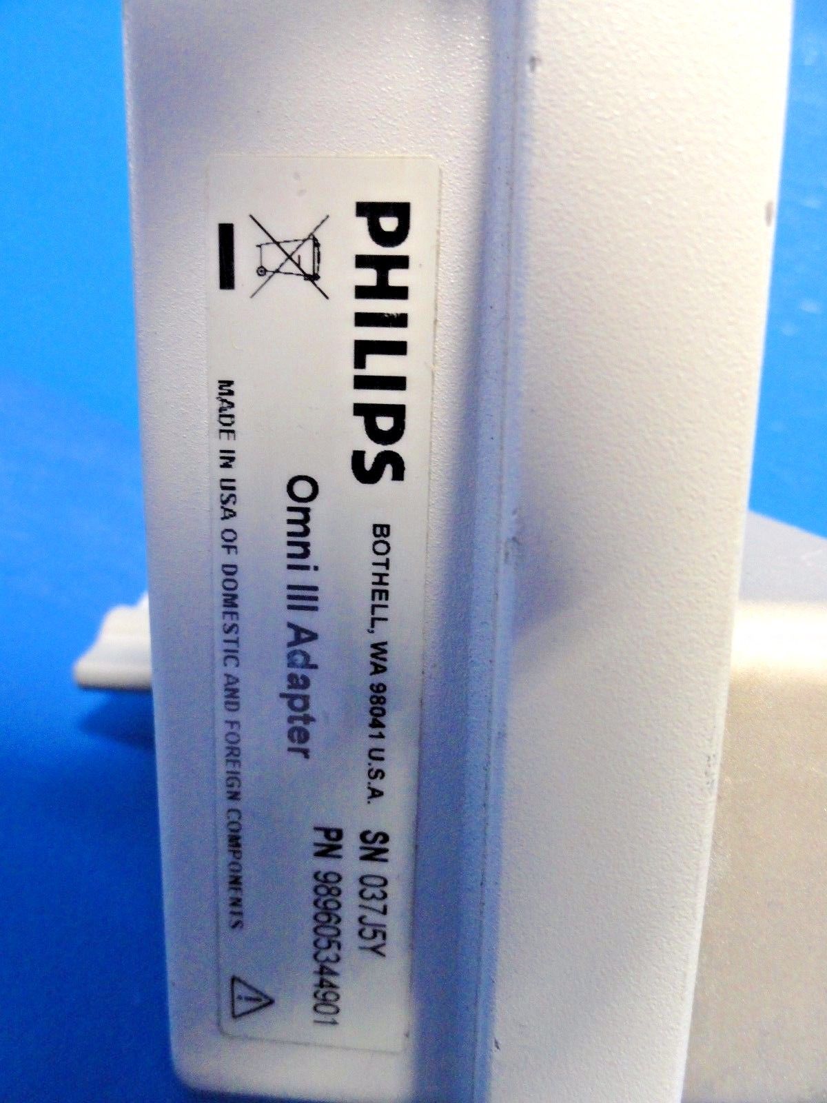 a close up of a white object on a blue surface