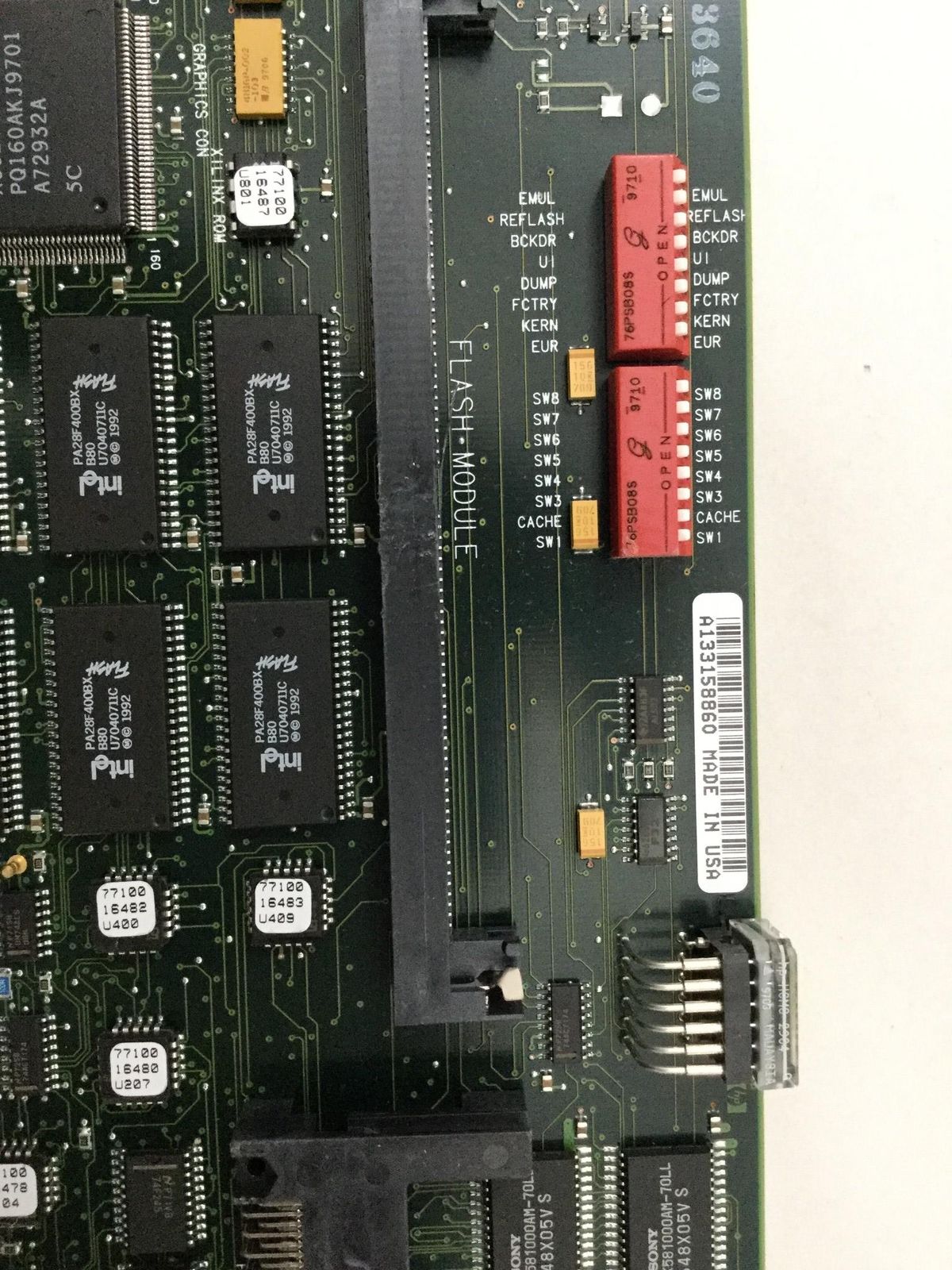 a close up of a computer motherboard with many wires